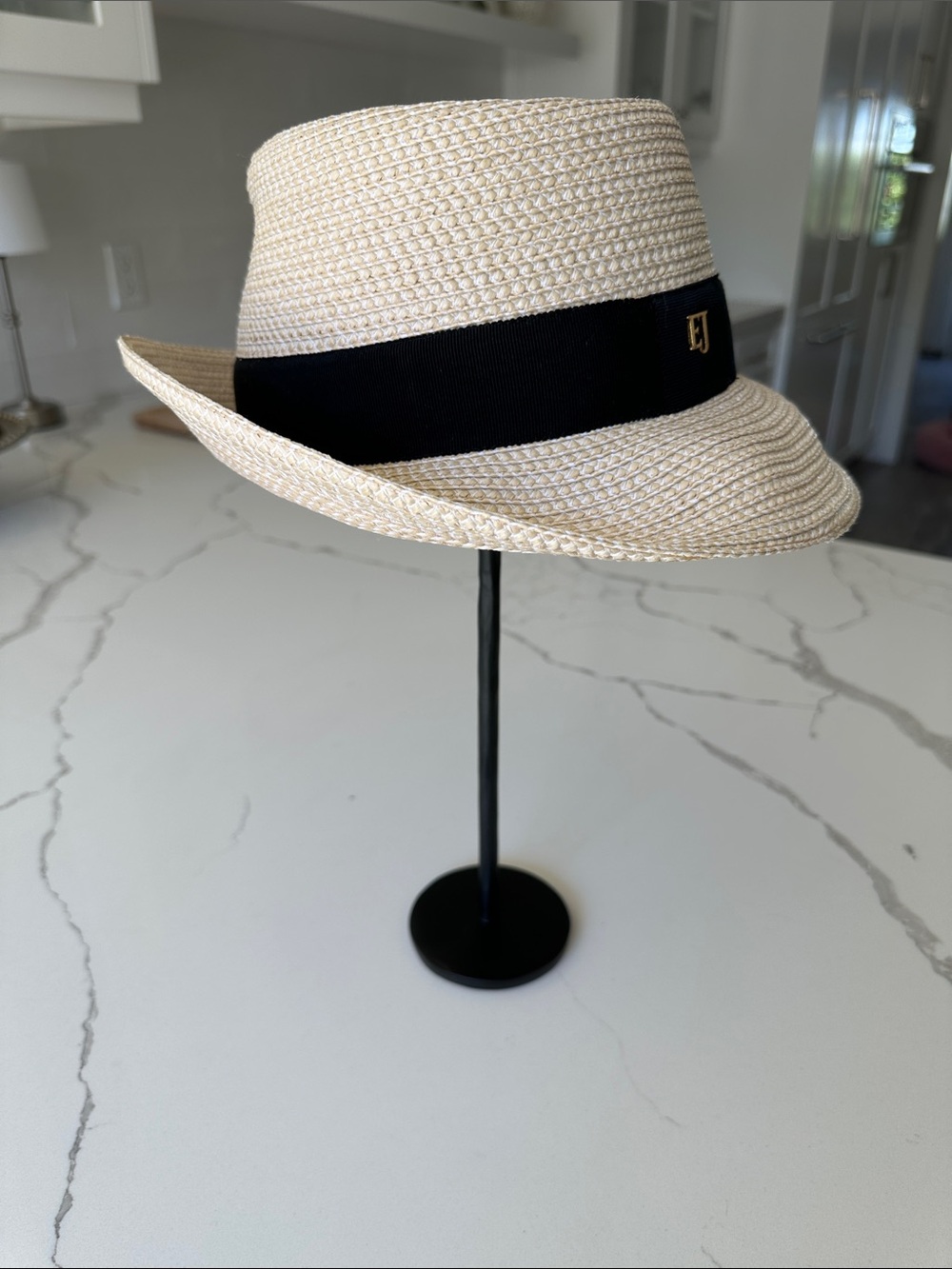Eric Javits sun hat. Light woven black ribbon trim with  EJ.